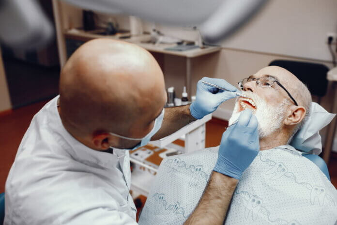 zubár, zubný implantát